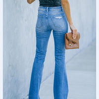 New Women's Denim Trousers With Ripped Holes And Washed Thin