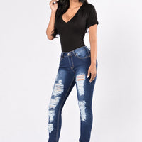 New style denim trousers with ripped jeans