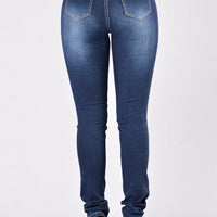 New style denim trousers with ripped jeans