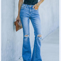 New Women's Denim Trousers With Ripped Holes And Washed Thin