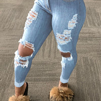 Explosion style ripped denim trousers